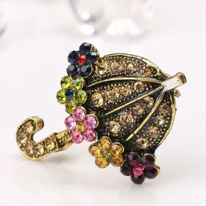 Elegant Gold and Multicolor Floral Umbrella Brooch